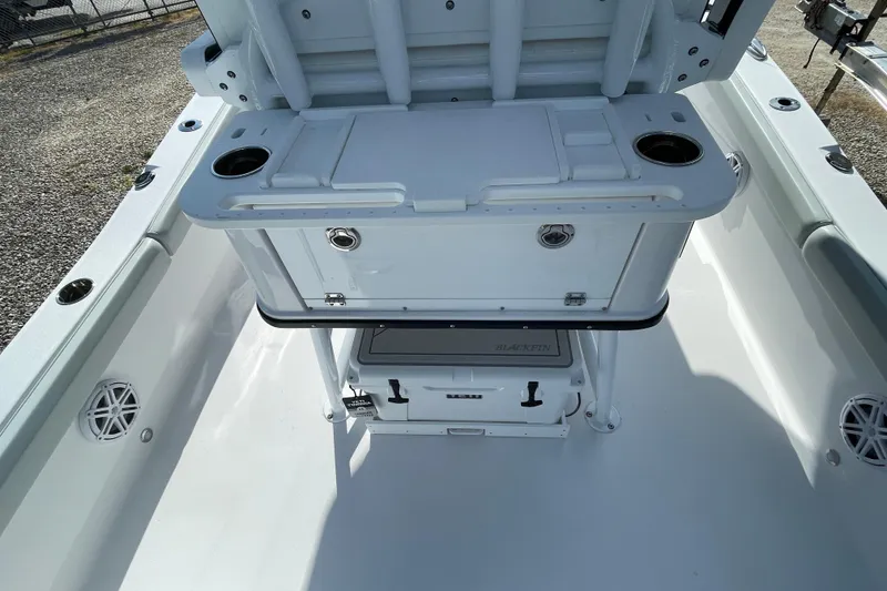 Slide: The Image of 2026 Blackfin 242HB boat interior with storage and cup holders. - 21