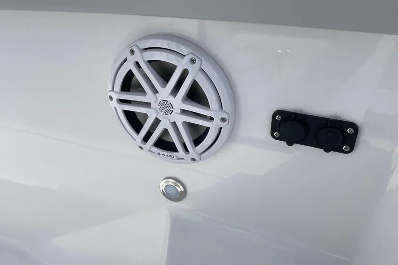 Slide: The Image of 2026 Blackfin 242HB boat featuring JL Audio speaker and dual power outlets. - 27
