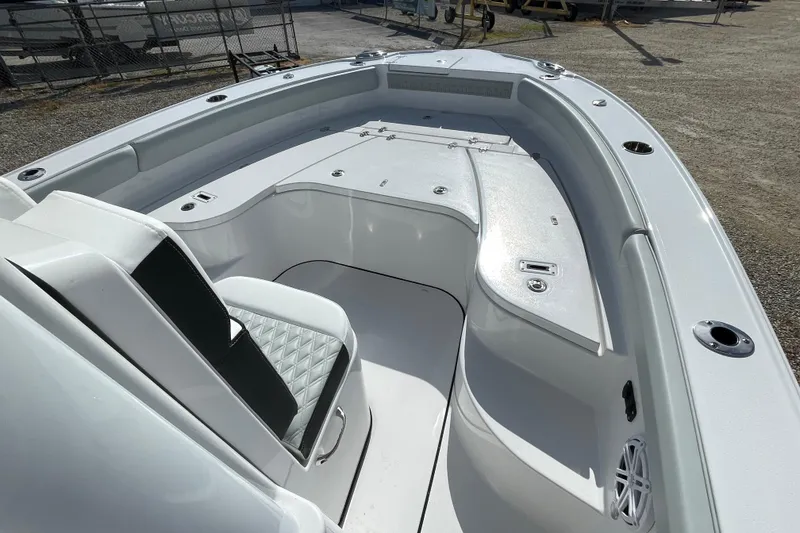 Slide: The Image of 2026 Blackfin 242HB boat interior with seating and storage compartments. - 7