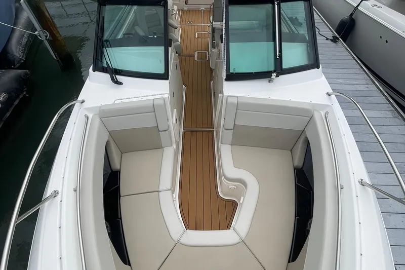 Slide: The Image of BOW SEATING OVERVIEW WITH REMOVABLE CUSHIONS & ARM RESTS, WITH STORAGE BENEATH THE SEATS - 14