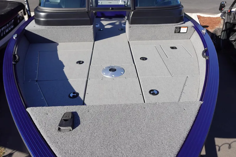 Slide: The Image of 2025 G3 AV19SF boat deck with gray carpet and storage compartments. - 12