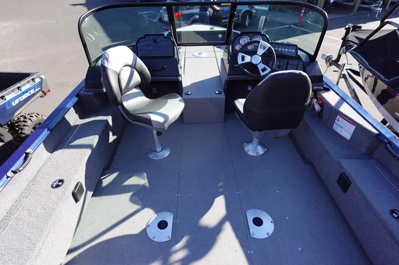 Slide: The Image of Interior of 2025 G3 AV19SF boat with dual seats and control panel. - 15