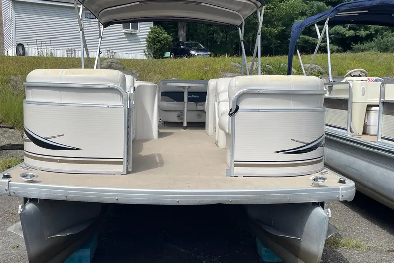 Slide: The Image of 2002 Godfrey Aqua Patio 2424DF pontoon boat with spacious seating and canopy. - 9