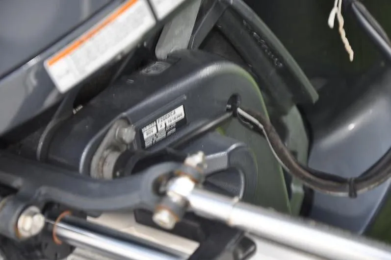 Slide: The Image of Close-up of 2023 Robalo R272 Center Console boat engine components. - 37