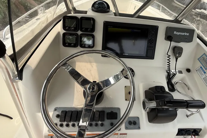 Slide: The Image of Garmin GPS display on 2008 Pursuit C 280 Center Console boat, showing navigation map. - 12