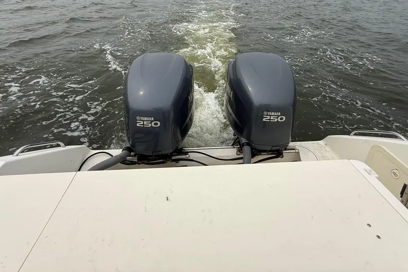 Slide: The Image of 2008 Pursuit C 280 Center Console with twin Yamaha 250 engines on water. - 7