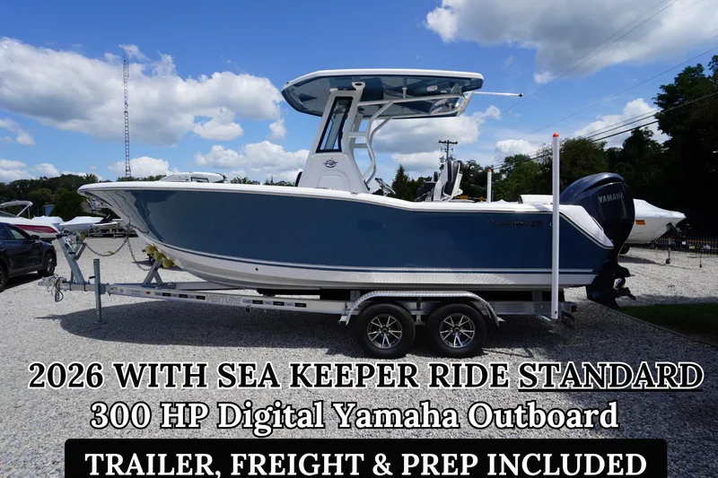 The Image of 2026 Tidewater 232 LXF boat with Yamaha 300 HP outboard on trailer, blue sky background. - 0