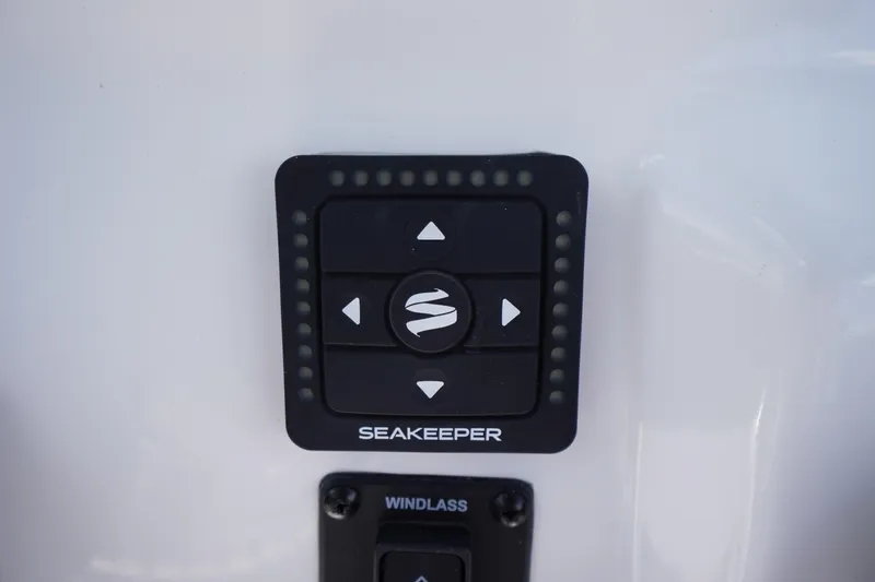 Slide: The Image of Control panel on 2026 Tidewater 232 LXF boat featuring Seakeeper and windlass controls. - 29