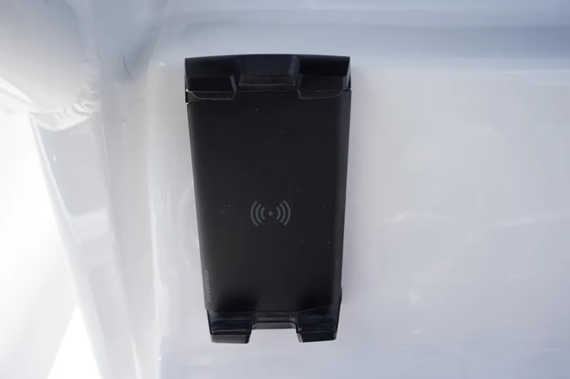 Slide: The Image of Wireless charging pad on 2026 Tidewater 232 LXF boat interior. - 30