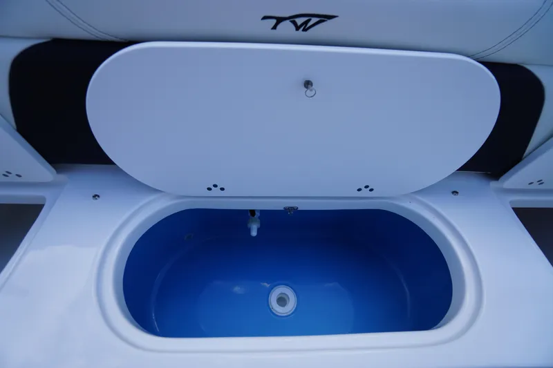 Slide: The Image of Livewell on 2026 Tidewater 232 LXF boat, featuring a sleek blue interior. - 52