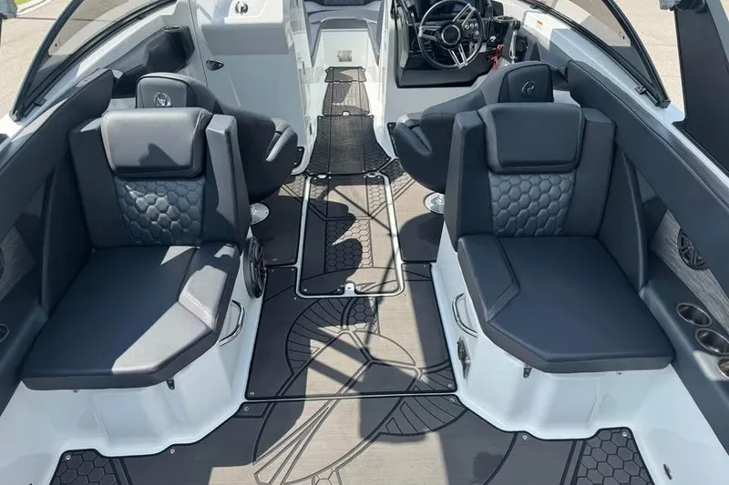 Slide: The Image of 2023 Scarab 255 ID boat interior with modern seating and sleek design. - 11