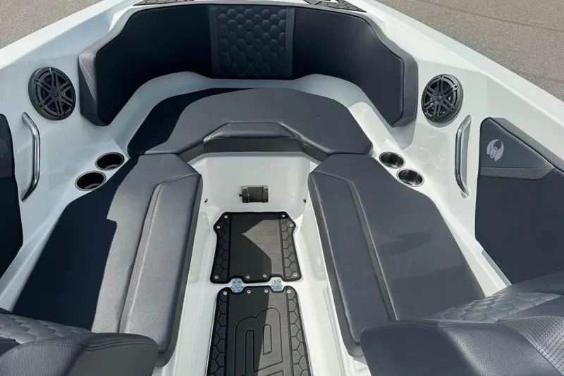 Slide: The Image of Interior of 2023 Scarab 255 ID boat with seating and speakers. - 13