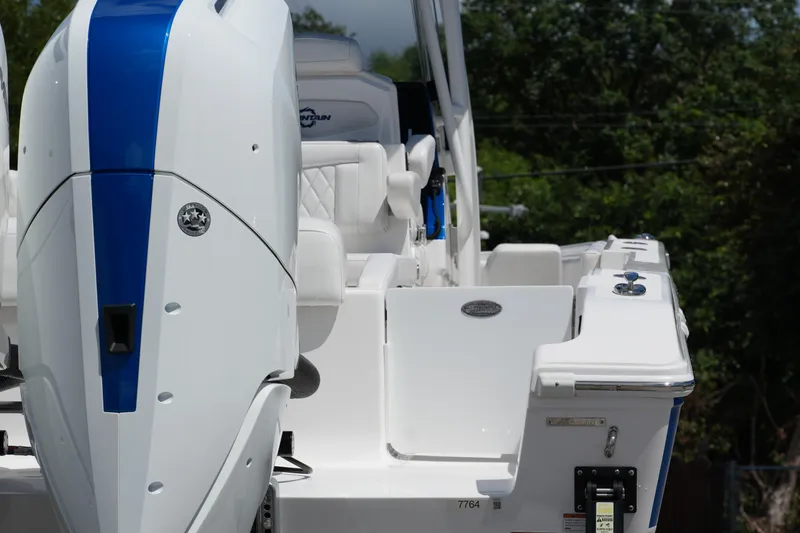 Slide: The Image of 2023 Fountain 34 Center Console boat with powerful engine, sleek design, and luxurious seating. - 12