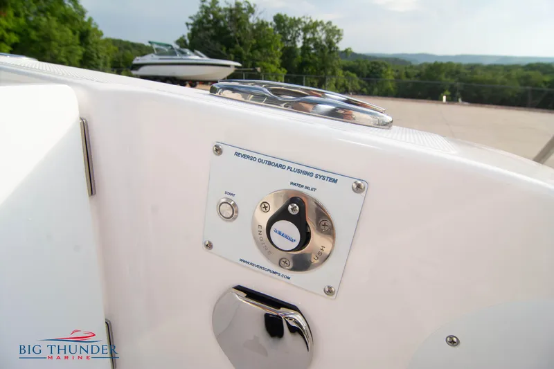 Slide: The Image of 2023 Fountain 34 CC boat with Reverso outboard flushing system, Big Thunder Marine logo. - 33