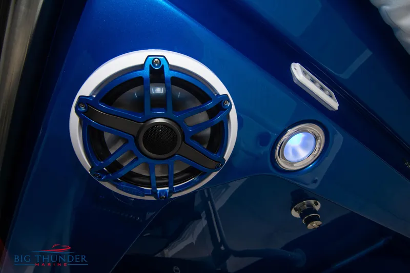 Slide: The Image of 2023 Fountain 34 CC boat speaker and light detail in blue interior. - 38