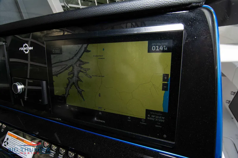 Slide: The Image of 2023 Fountain 34 CC boat GPS navigation display showing a detailed map. - 48