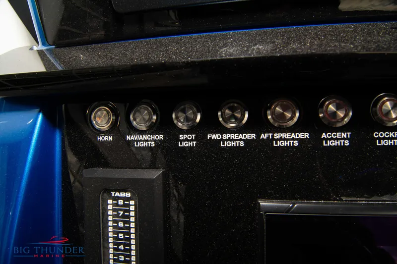 Slide: The Image of Control panel of 2023 Fountain 34 CC boat with labeled switches and buttons. - 50