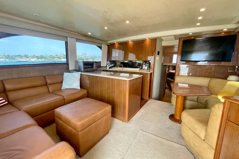 Slide: The Image of Luxurious interior of 2005 Viking 48 Convertible yacht with leather seating and modern amenities. - 32