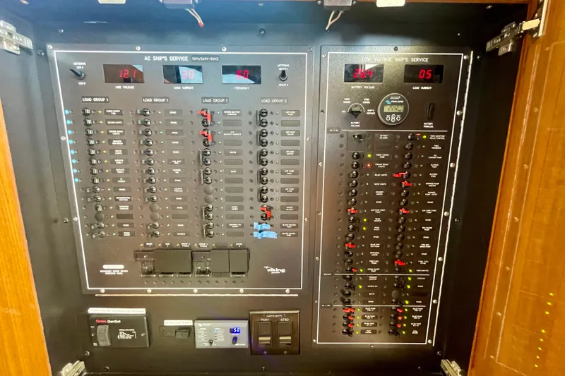 Slide: The Image of Electrical control panel on a 2005 Viking 48 Convertible yacht. - 39