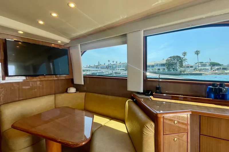Slide: The Image of Luxurious interior of 2005 Viking 48 Convertible yacht with waterfront view. - 40
