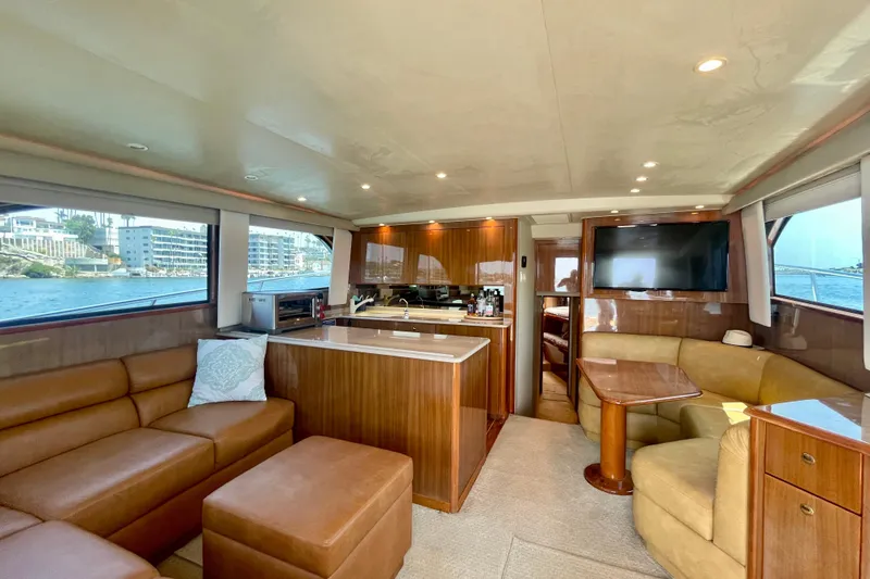 Slide: The Image of Luxurious interior of 2005 Viking 48 Convertible yacht with elegant seating and modern amenities. - 44