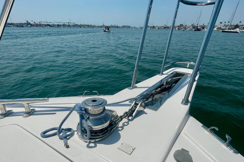 Slide: The Image of 2005 Viking 48 Convertible yacht bow with anchor chain and ocean view. - 78