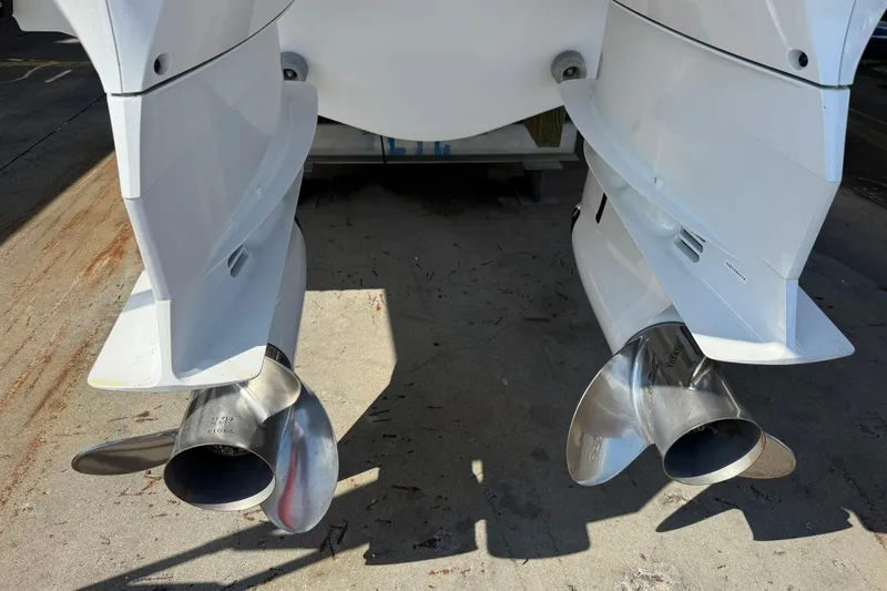 Slide: The Image of 2024 Jeanneau Leader 10.5 CC boat propellers, close-up view. - 13