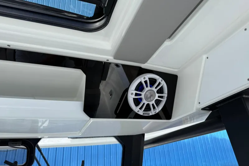 Slide: The Image of 2024 Jeanneau Leader 10.5 CC interior with Fusion speaker system. - 26