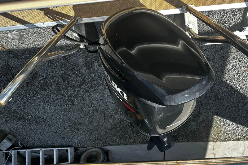 Slide: The Image of Overhead view of a Suzuki outboard motor on a 2015 Godfrey Sweetwater PE 220 DLX Fish Coastal boat. - 15