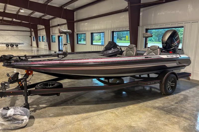 The Image of 2025 Skeeter ZX150 bass boat in showroom, featuring sleek design and modern equipment. - 1