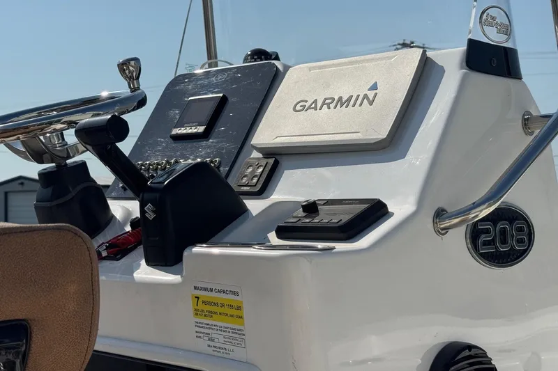 Slide: The Image of 2023 Sea Pro 208 Bay boat dashboard with Garmin navigation system. - 3