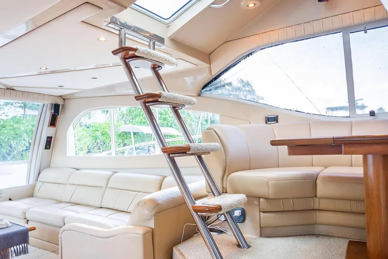 Slide: The Image of Luxurious interior of 2001 Cruisers Yachts 5000 Sedan Sport with plush seating and elegant design. - 16