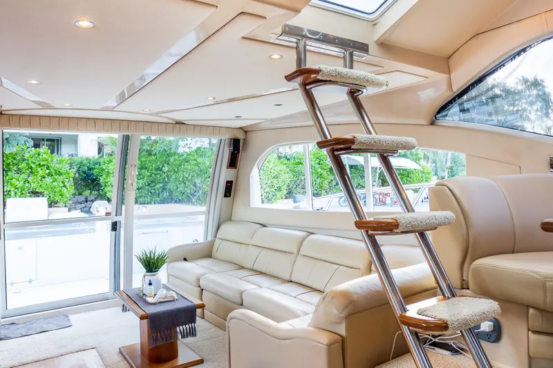 Slide: The Image of Luxurious interior of 2001 Cruisers Yachts 5000 Sedan Sport with plush seating and modern design. - 17