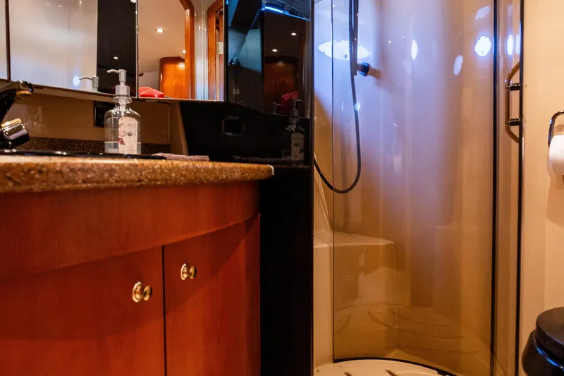 Slide: The Image of Luxurious bathroom in 2001 Cruisers Yachts 5000 Sedan Sport with modern fixtures. - 33