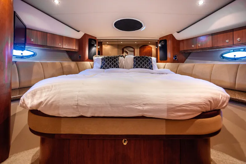Slide: The Image of Luxurious bedroom interior of 2001 Cruisers Yachts 5000 Sedan Sport. - 37