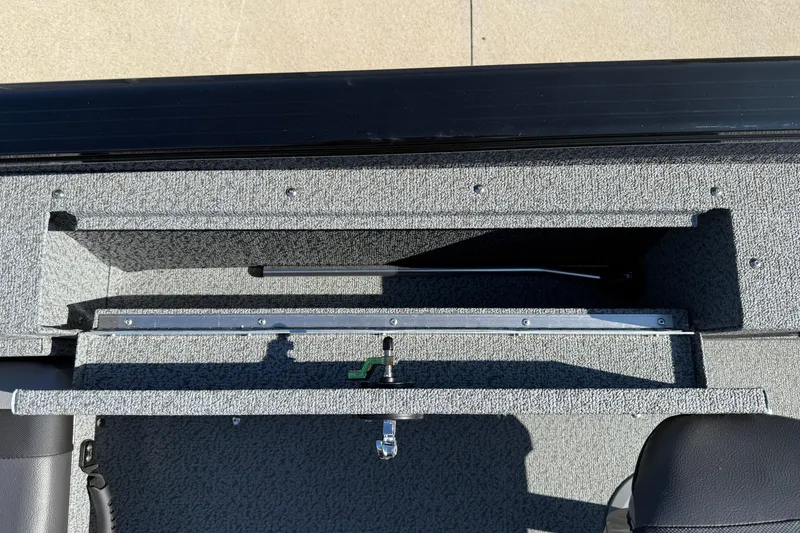 Slide: The Image of Interior view of 2026 Lund 1675 Adventure SS boat storage compartment. - 22