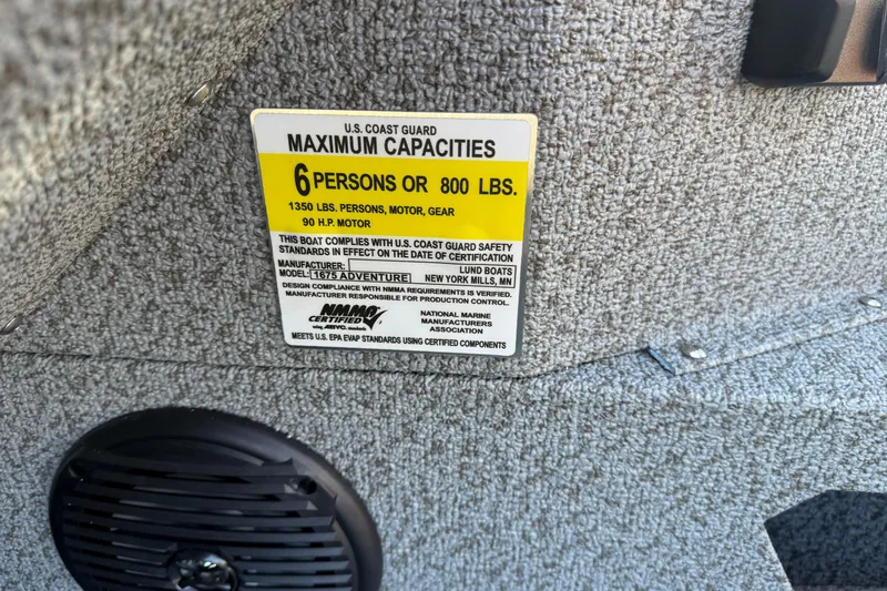 Slide: The Image of 2026 Lund 1675 Adventure SS capacity label, 6 persons or 800 lbs, U.S. Coast Guard certified. - 28