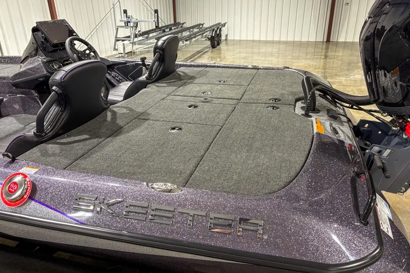 Slide: The Image of 2026 Skeeter ZXR 19 boat interior with dual seats and control panel. - 10