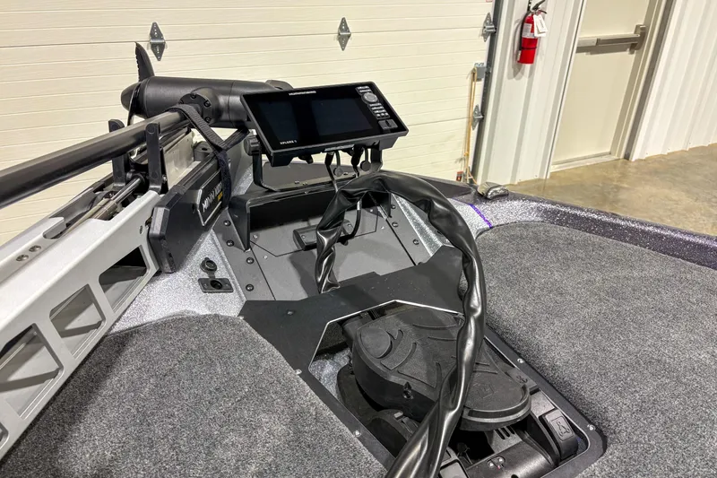 Slide: The Image of 2026 Skeeter ZXR 19 boat dashboard with advanced navigation system and controls. - 7