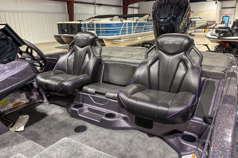 Slide: The Image of 2026 Skeeter ZXR 19 boat interior with sleek black seats and modern design. - 8