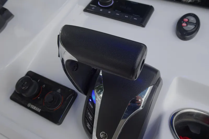 Slide: The Image of Control panel of 2023 Sportsman Heritage 231 Center Console boat with Yamaha throttle. - 12