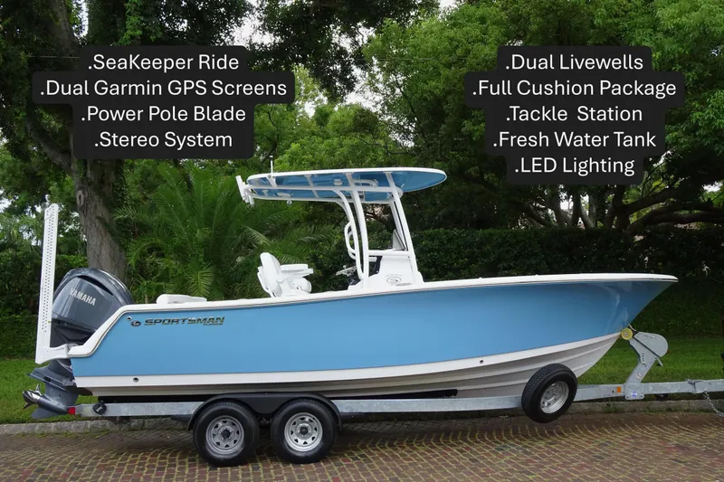 Slide: The Image of 2023 Sportsman Heritage 231 Center Console boat with dual Garmin GPS, SeaKeeper Ride, and LED lighting. - 3