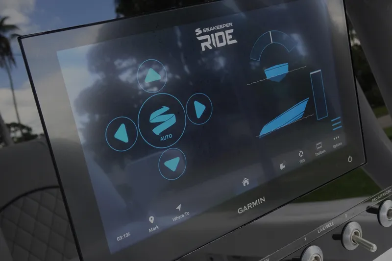 Slide: The Image of Touchscreen display on 2023 Sportsman Heritage 231 Center Console boat, featuring Seakeeper Ride system. - 7