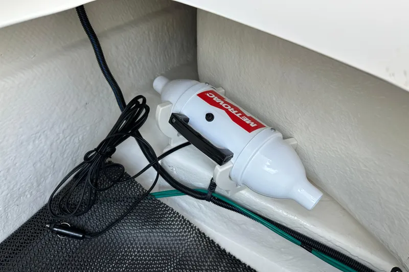 Slide: The Image of 2024 Chaparral 26 Surf boat interior with Metrovac vacuum cleaner. - 13