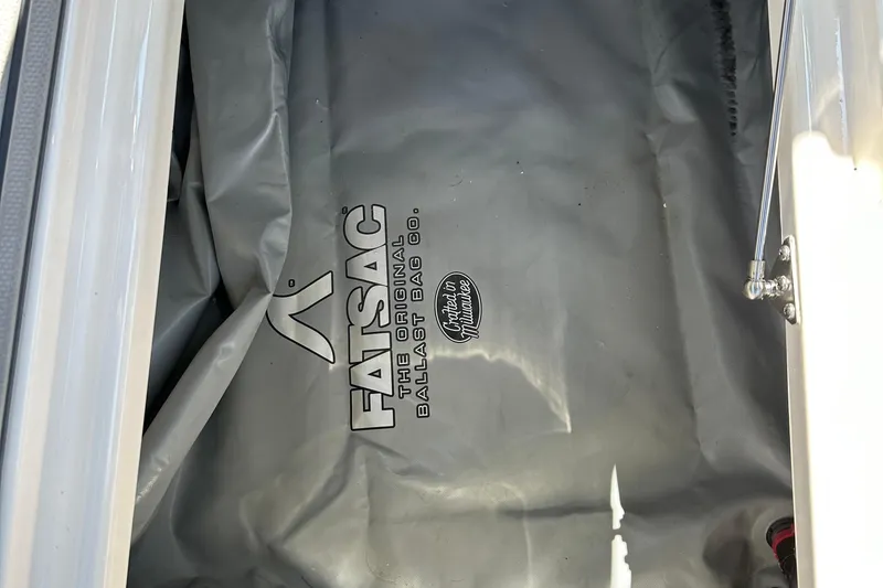 Slide: The Image of Ballast bag in 2024 Chaparral 26 Surf boat, featuring FATSAC branding. - 15