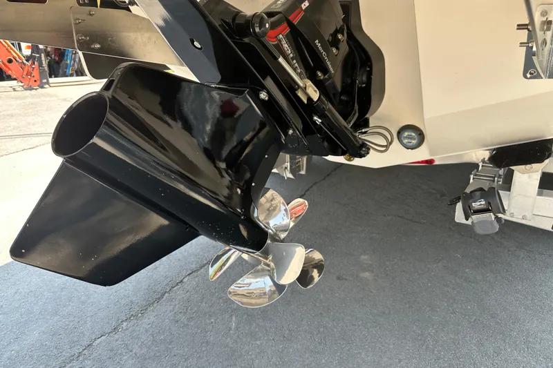 Slide: The Image of 2024 Chaparral 26 Surf boat propeller and stern detail, showcasing sleek design and engineering. - 23