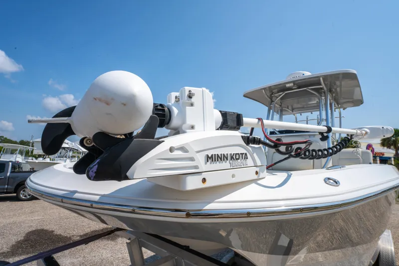 Slide: The Image of 2020 Sea Cat 26 Hybrid boat with Minn Kota Terrova motor, docked under clear blue sky. - 10