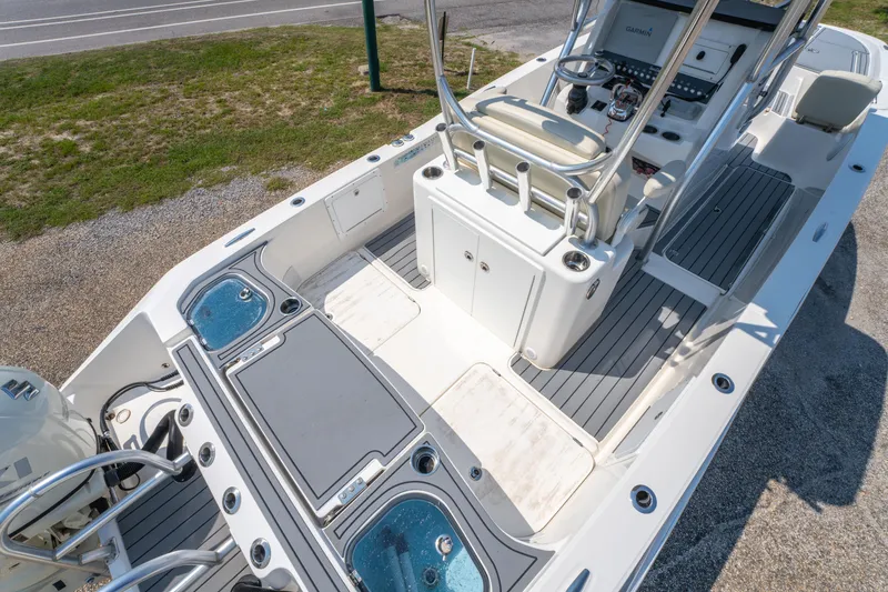 Slide: The Image of 2020 Sea Cat 26 Hybrid boat interior with modern console and seating. - 13