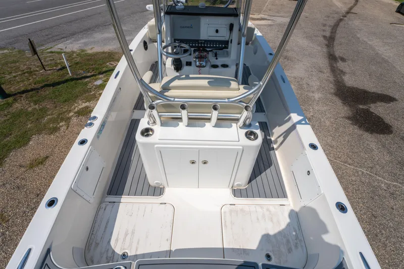 Slide: The Image of 2020 Sea Cat 26 Hybrid boat interior with steering console and rod holders. - 14