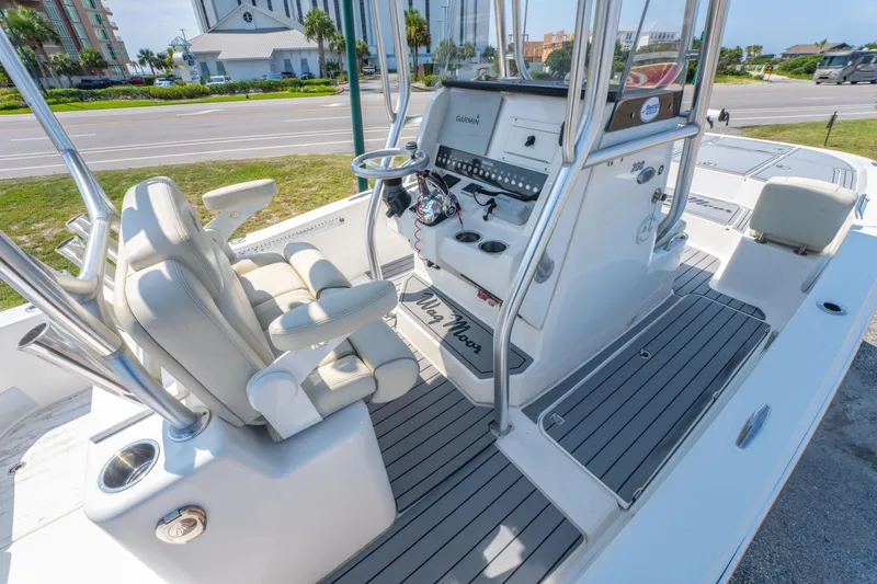 Slide: The Image of 2020 Sea Cat 26 Hybrid boat interior with helm, seating, and controls. - 18